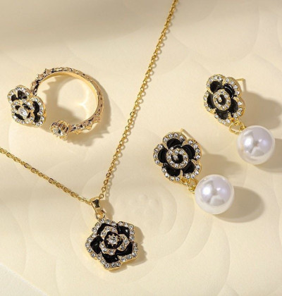 4-piece black floral jewelry set for women, necklace, earrings, and ring, personalized creative jewelry, fashionable and versatile